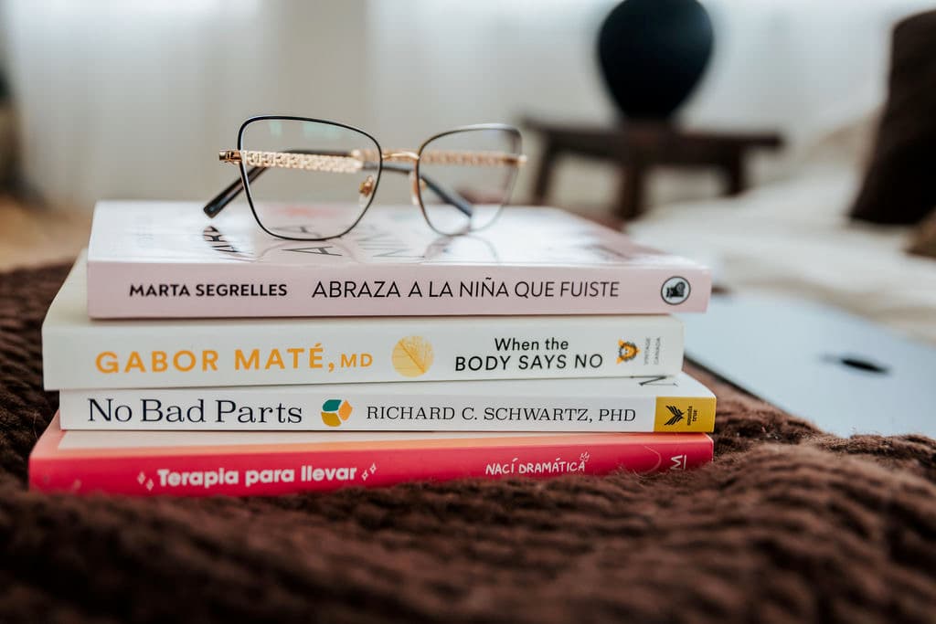 Therapy books and glasses in a calm space